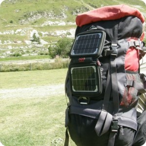 portable solar charger attached to backpack