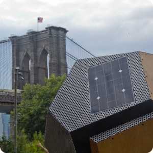 solar charging station with brooklyn bridge in background