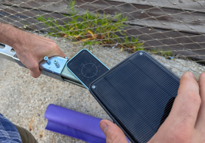 Using a compass to position solar panel toward the south 